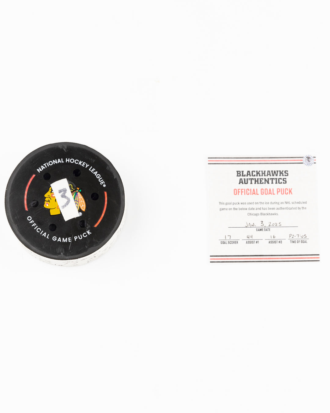 official Chicago Blackhawks game used hockey goal puck scored by player Nick Foligno against Montreal Canadiens on January 3, 2025 - front lay flat of puck and certificate