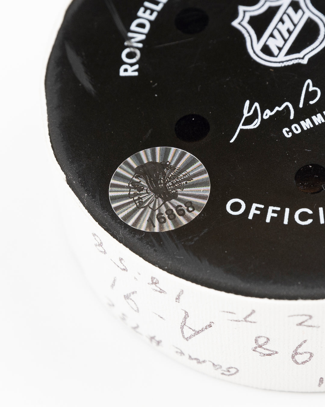 official Chicago Blackhawks game used goal hockey puck scored by Seth Jones against the Vegas Golden Knights on January 18, 2025 - hologram sticker detail lay flat