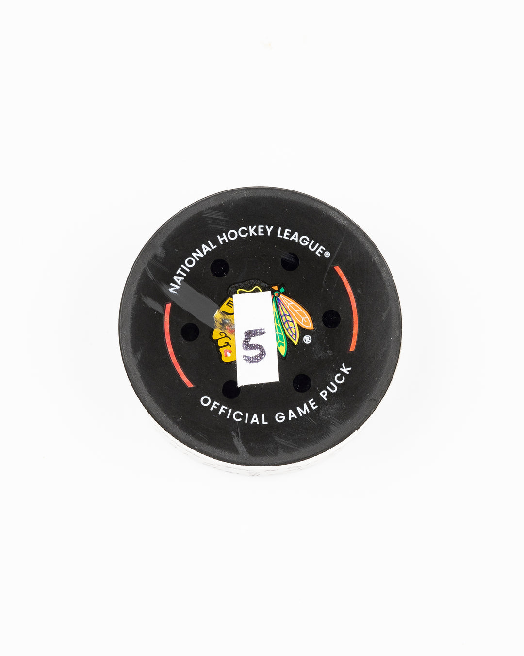 official Chicago Blackhawks game used goal puck scored by Ryan Donato against the Carolina Hurricanes on January 20, 2025 - front lay flat