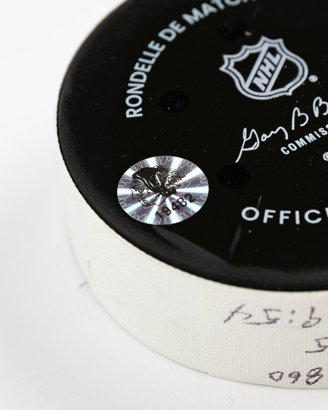 official Chicago Blackhawks game-used goal puck scored by Lukas Reichel on February 5, 2025 - hologram sticker detail lay flat
