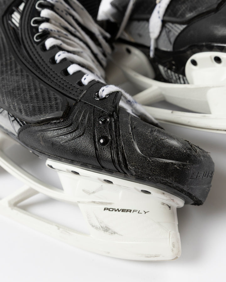 Bauer brand hockey skates game worn and used by Chicago Blackhawks player Alec Martinez - tip detail lay flat