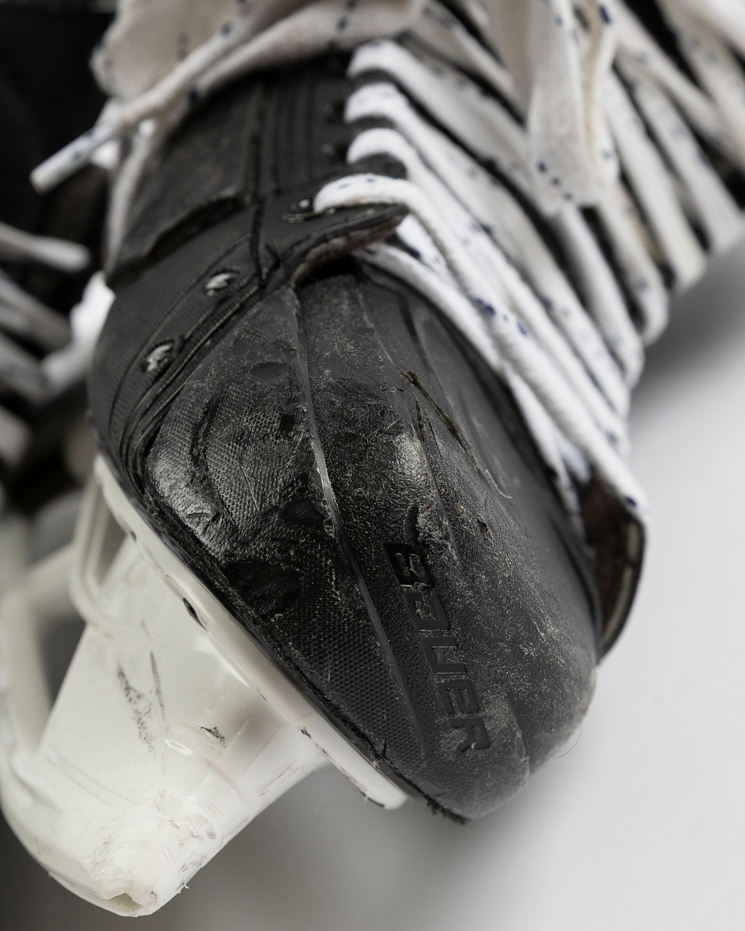Bauer brand hockey skates game worn and used by Chicago Blackhawks player Alec Martinez - scuff detail lay flat