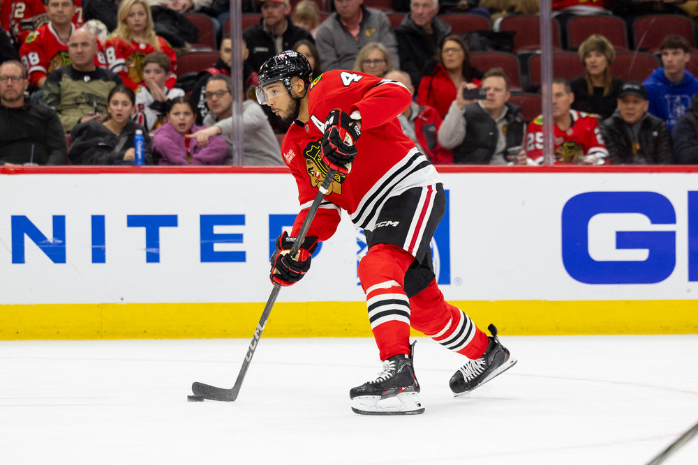 Chicago Blackhawks player Seth Jones scoring goal against Vegas Golden Knights on January 18, 2025