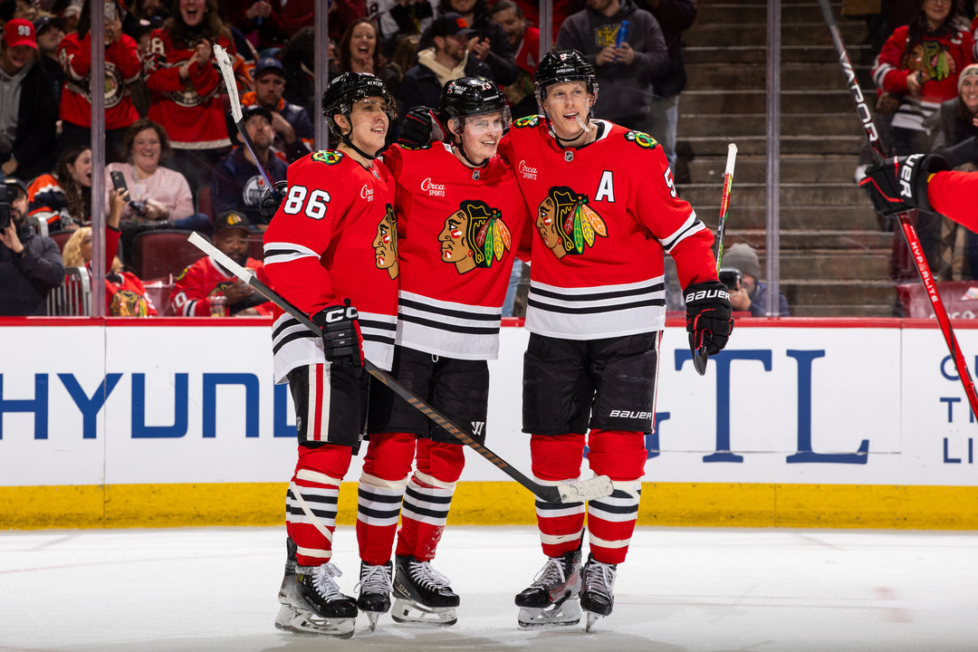 Chicago Blackhawks players Teravainen, Reichel and Murphy celebrating goal scored by Reichel against Edmonton on February 5, 2025