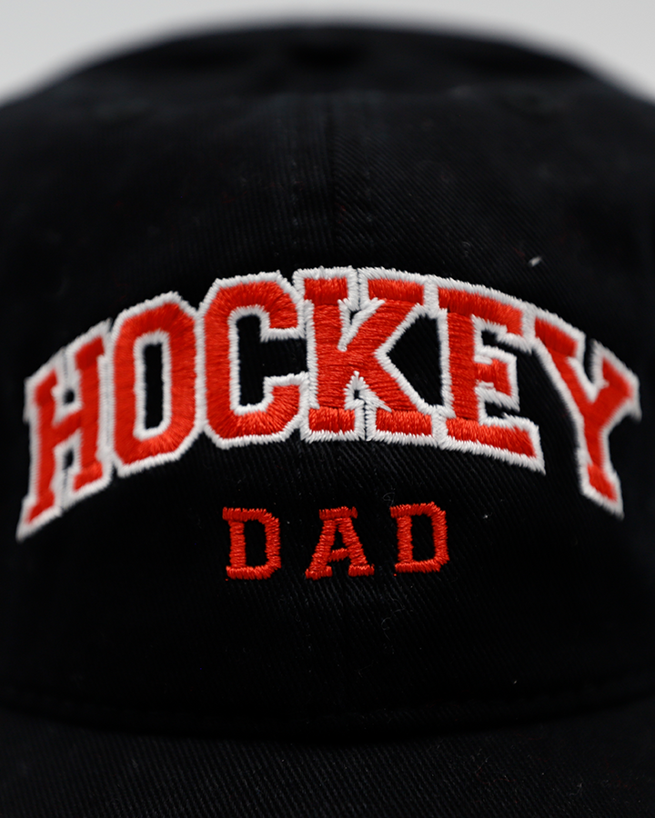 black Legacy adjustable hat with embroidered Hockey Dad wordmark on front and Hammy Rockford IceHogs logo on left side - front detail lay flat