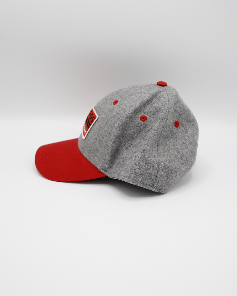 Legacy red and grey adjustable hat with IceHogs Hockey patch on front and Hammy Rockford IceHogs logo on right side - left side lay flat
