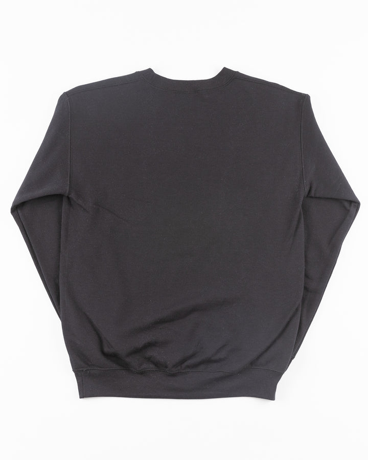 black Chicago Blackhawks crewneck with wordmark and primary logo on chest and secondary logo on left wrist - back lay flat