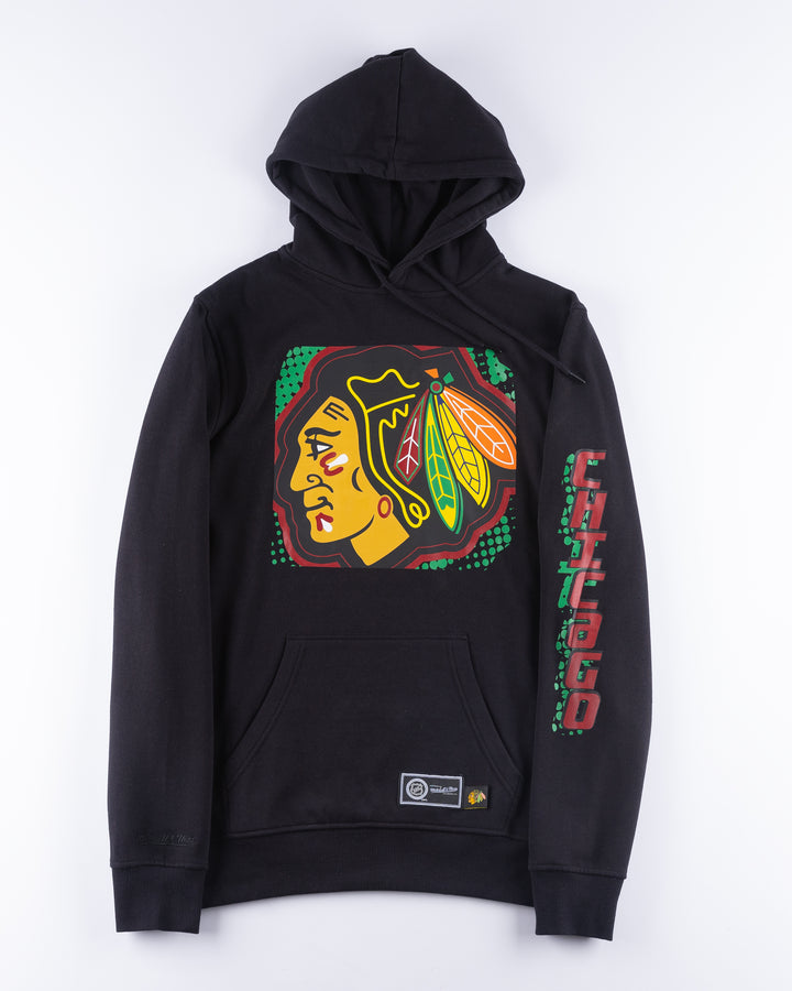 black Mitchell &amp; Ness hoodie with Chicago Blackhawks primary logo across front and Chicago wordmark on left arm - front lay flat