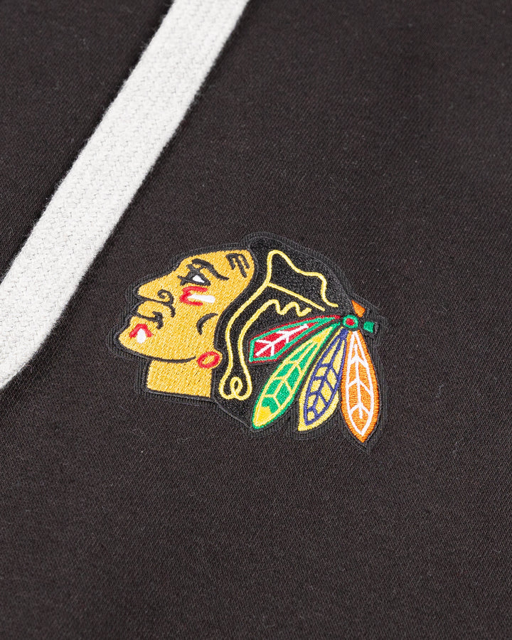 black big &amp; tall Antigua hoodie with embroidered Chicago Blackhawks primary logo on left chest - detail lay flat