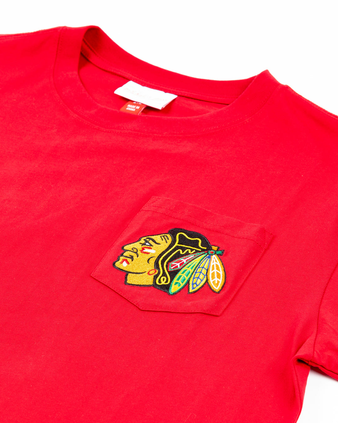 red Mitchell &amp; Ness short sleeve tee with Chicago Blackhawks primary logo on left chest pocket - front detail lay flat