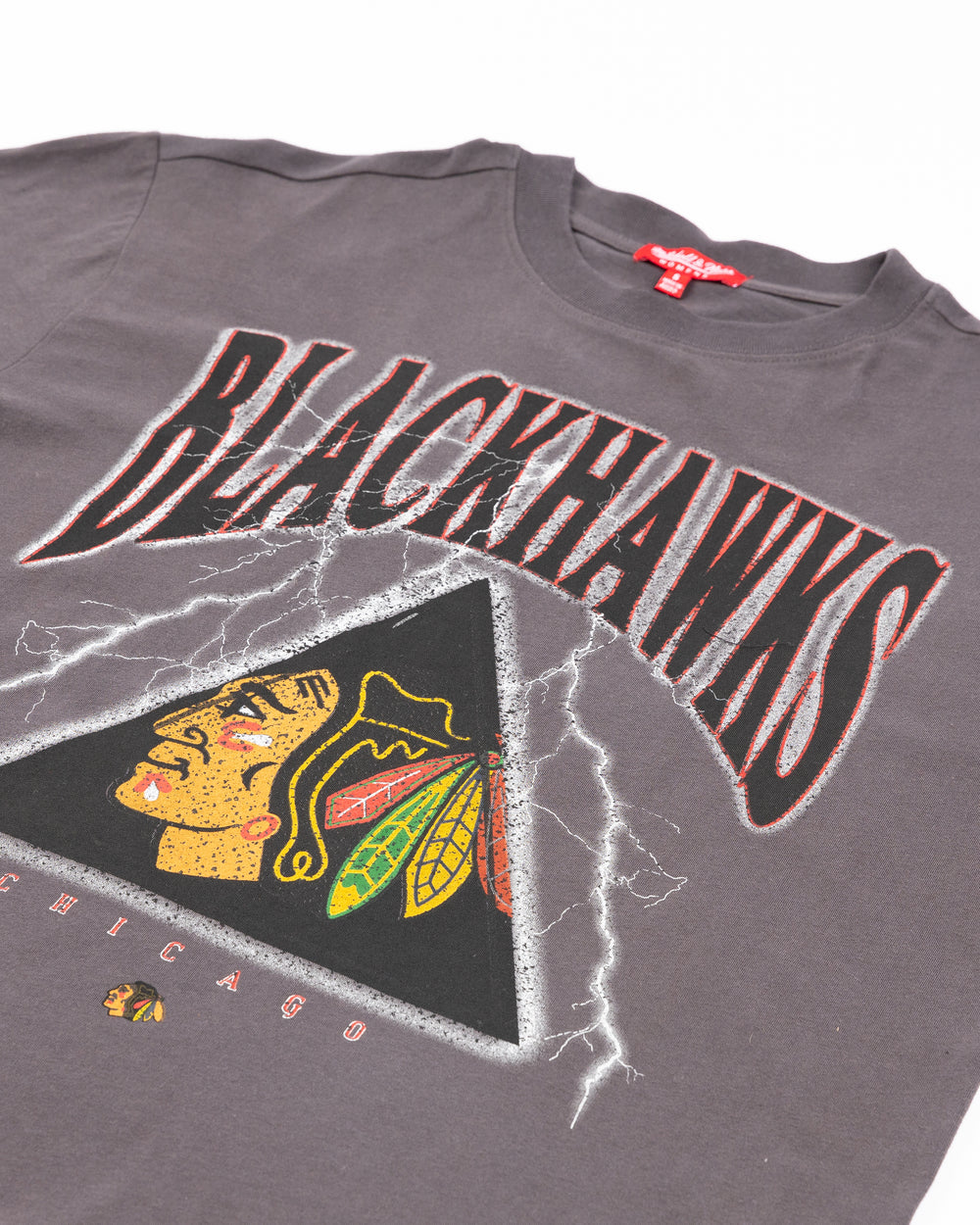grey Mitchell & Ness oversized women's tee with Chicago Blackhawks wordmark and primary logo rock inspired design on front - front detail lay flat