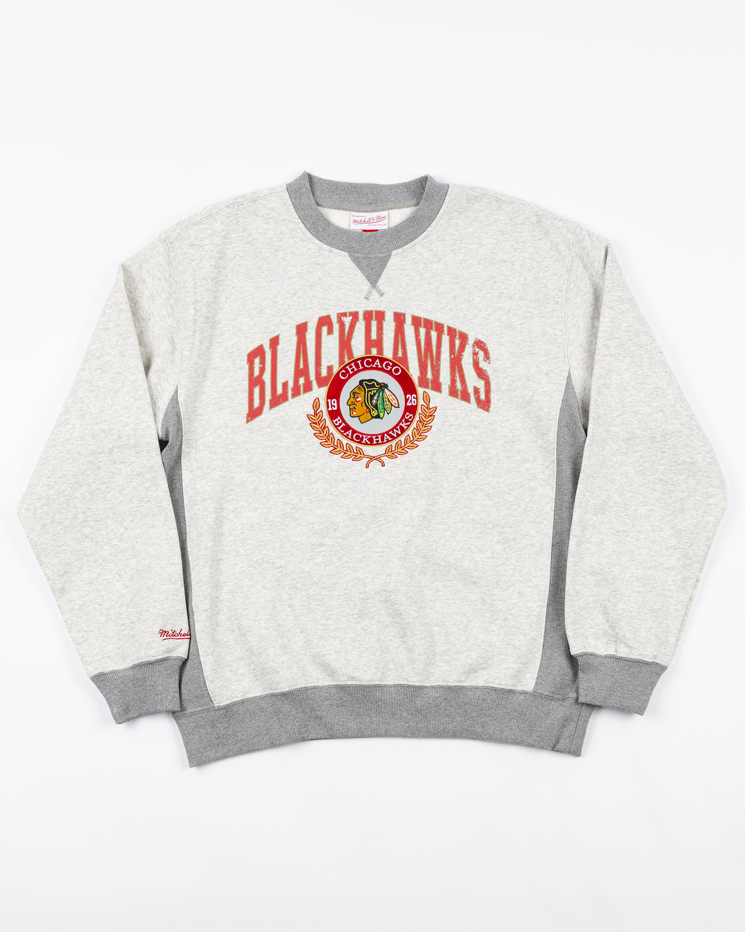 grey Mitchell & Ness crewneck with Chicago Blackhawks collegiate-inspired wordmark and primary logo on front - front lay flat