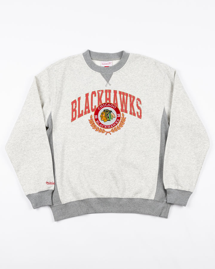 grey Mitchell &amp; Ness crewneck with Chicago Blackhawks collegiate-inspired wordmark and primary logo on front - front lay flat