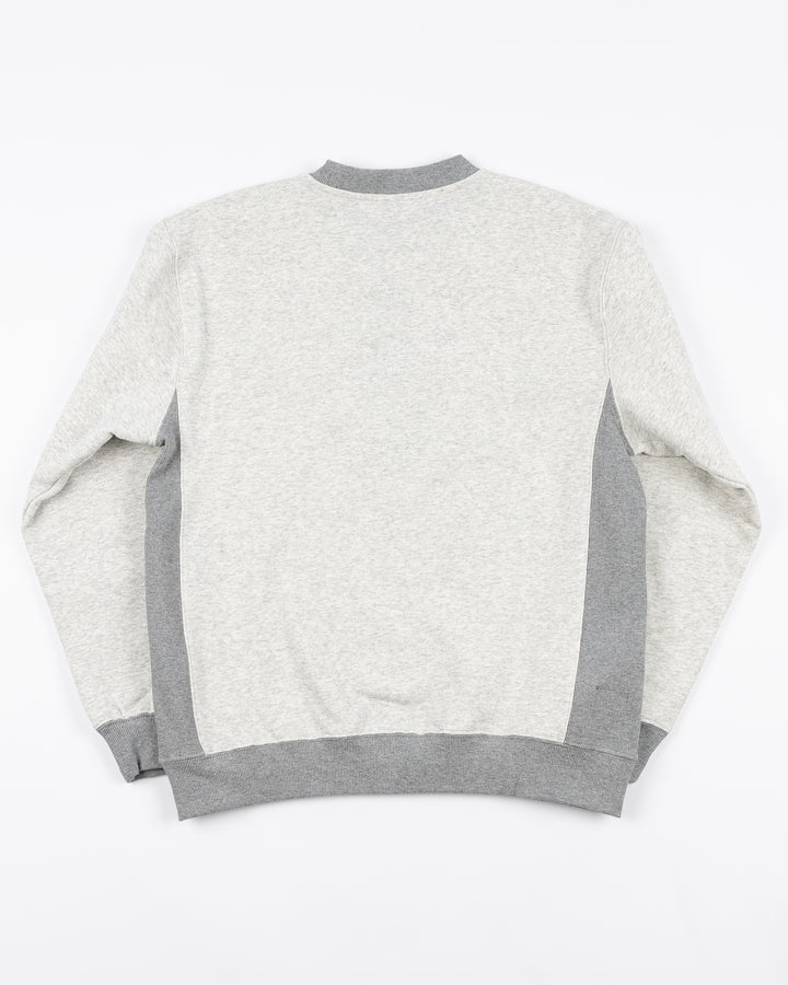 grey Mitchell &amp; Ness crewneck with Chicago Blackhawks collegiate-inspired wordmark and primary logo on front - back lay flat