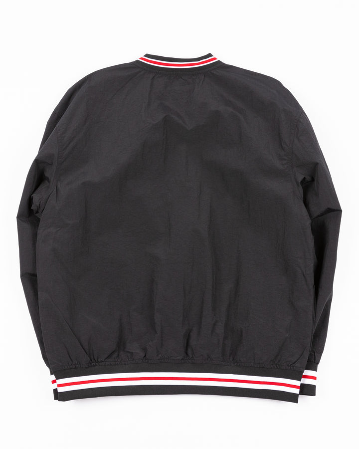 black Mitchell &amp; Ness pullover windbreaker with Chicago Blackhawks secondary logo on front and primary logo on right shoulder and NHL Western Conference on left cuff - back lay flat