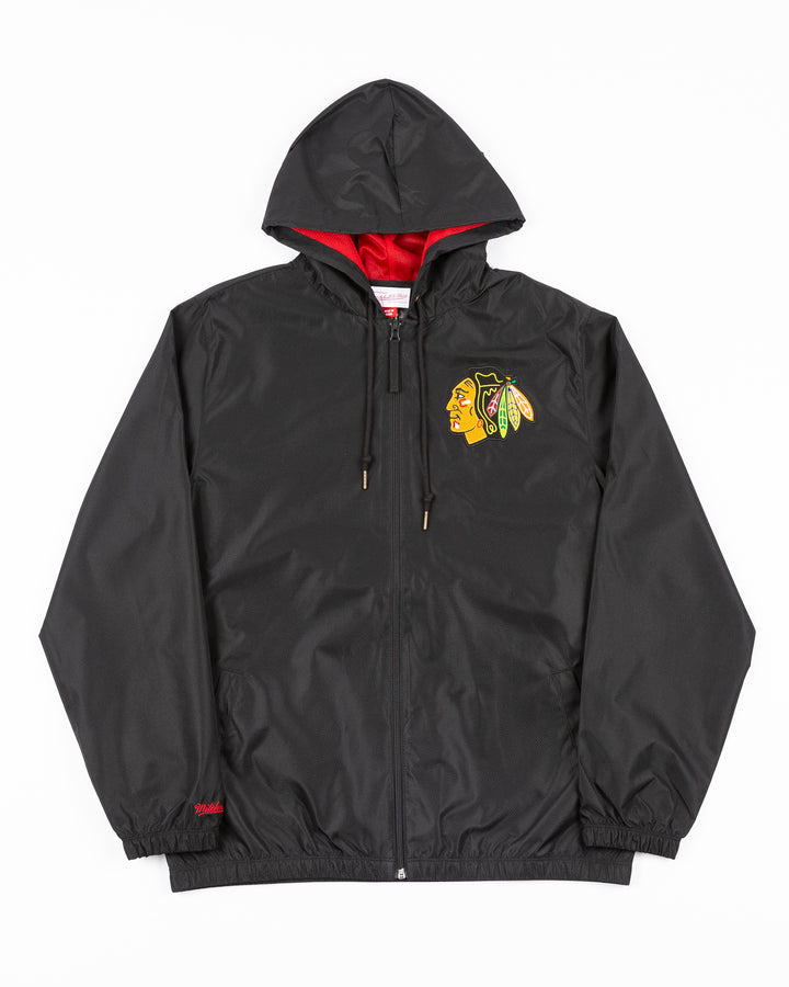 black Mitchell &amp; Ness windbreaker jacket hoodie with Chicago Blackhawks primary logo embroidered on left chest  front lay flat