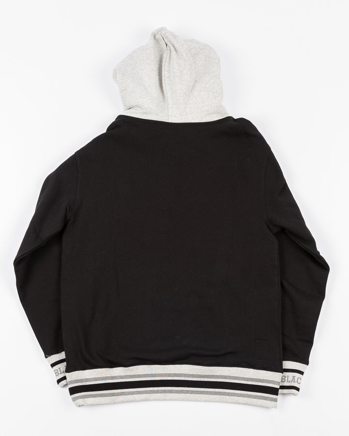 two tone black and grey Mitchell &amp; Ness hoodie with Chicago Blackhawks wordmark and primary logo on front - back lay flat