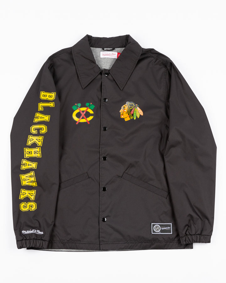 black Mitchell &amp; Ness coaches jacket with Chicago Blackhawks secondary logo on right chest and primary logo on left chest and wordmark down right sleeve - front lay flat
