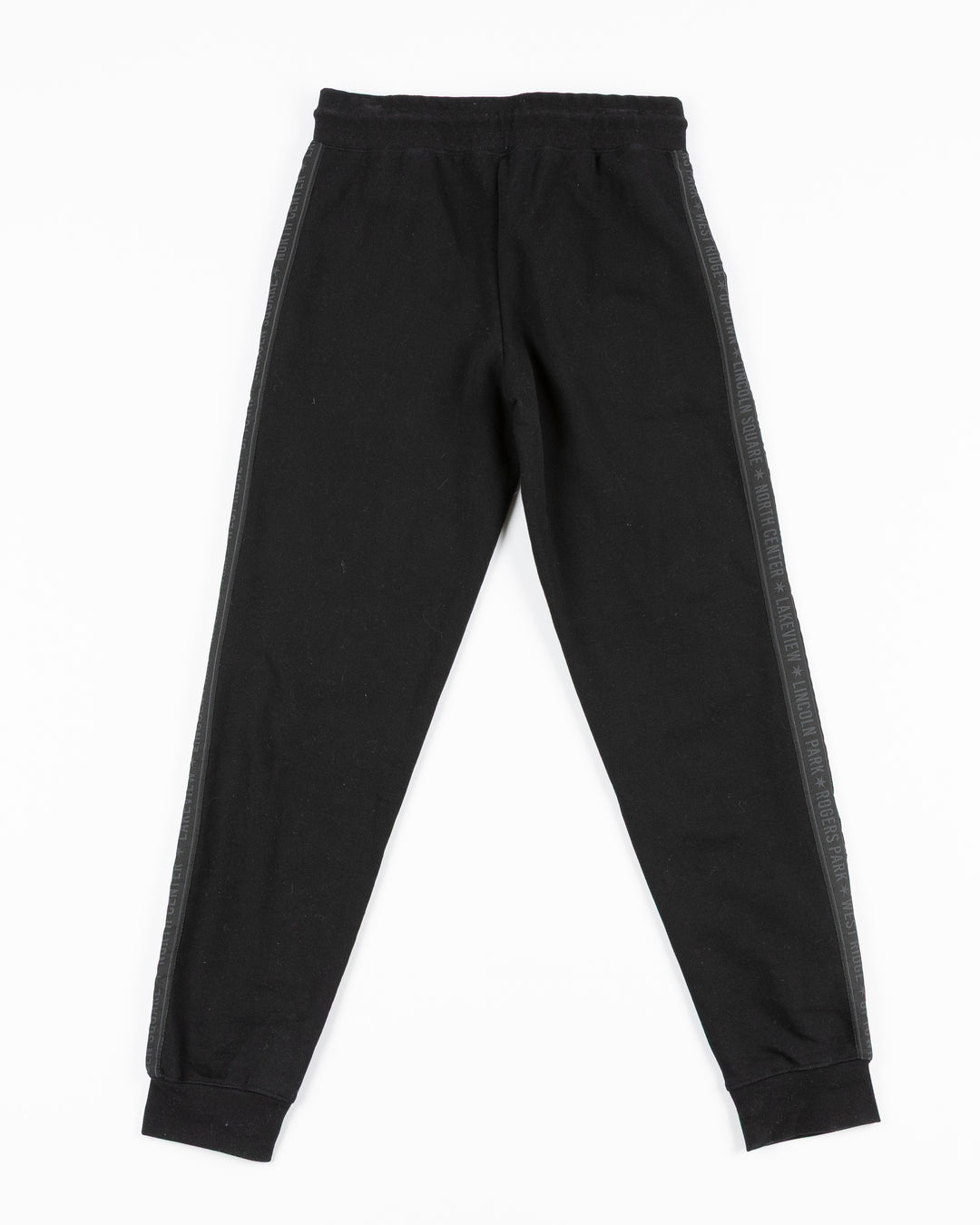 black sweatpants with Chicago Blackhawks secondary logo embroidered in Chicago flag colorway on left thigh and Chicago neighborhood names down sides - back lay flat