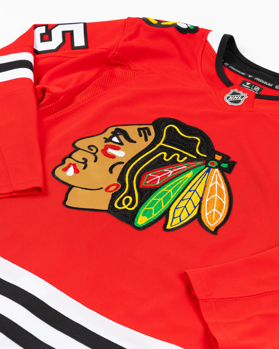 red Fanatics Premium Chicago Blackhawks Home Jersey with Artyom Levshunov name and number 55 - front detail lay flat