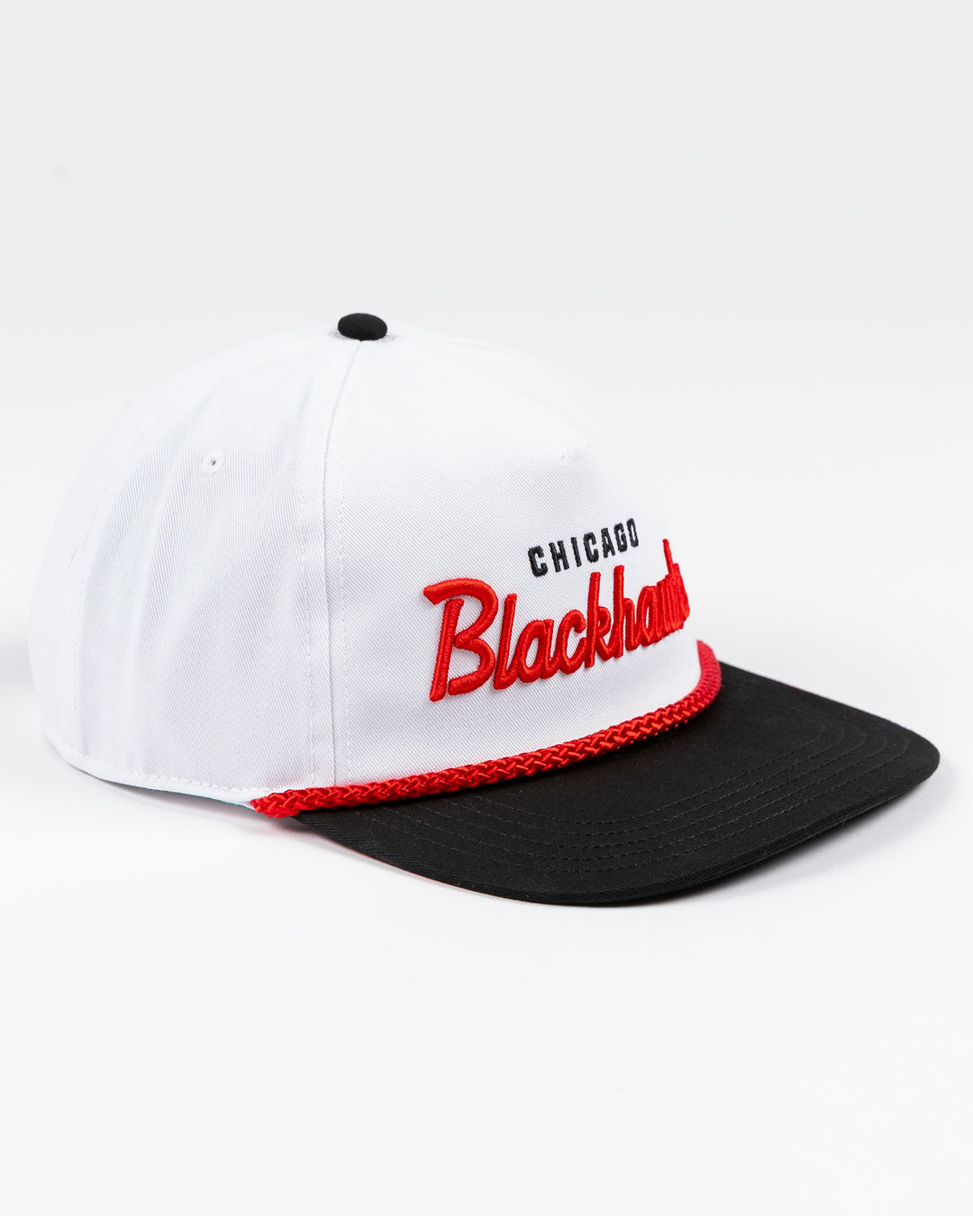 American Needle white rope snapback hat with Chicago Blackhawks wordmark on the front and primary logo on left side - right angle lay flat