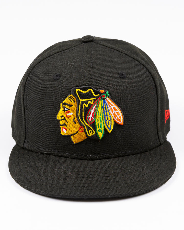black New Era fitted 59FIFTY hat with embroidered Chicago Blackhawks primary logo on front and secondary logo on back - front lay flat