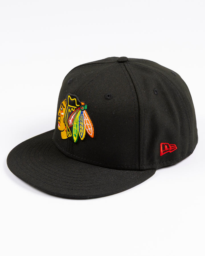 black New Era fitted 59FIFTY hat with embroidered Chicago Blackhawks primary logo on front and secondary logo on back - left angle lay flat