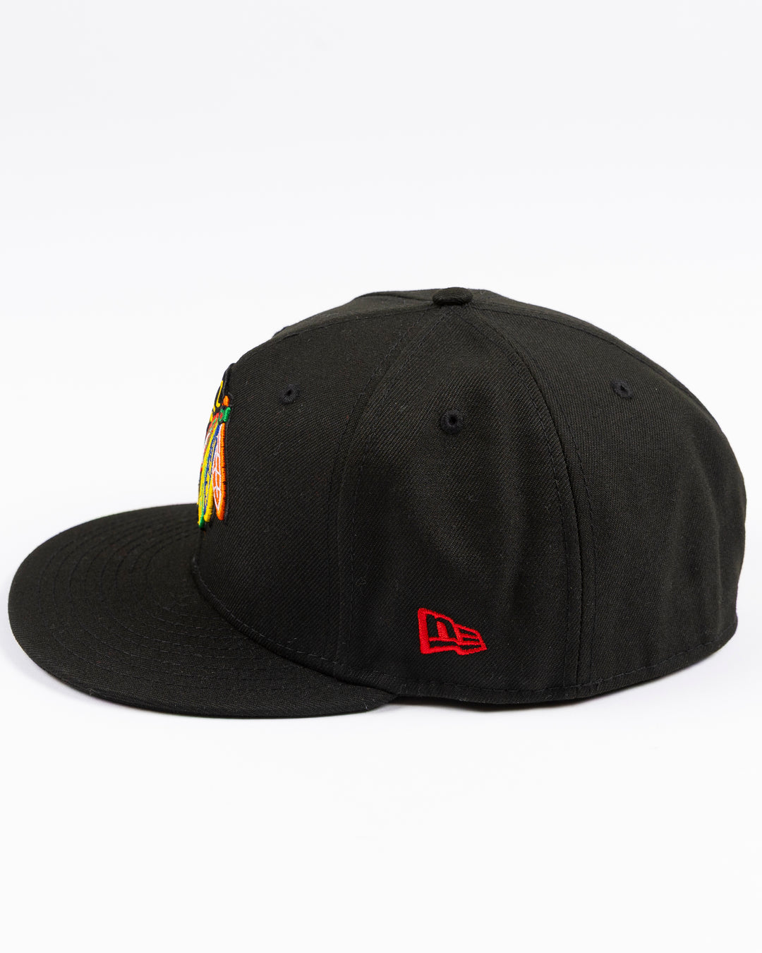black New Era fitted 59FIFTY hat with embroidered Chicago Blackhawks primary logo on front and secondary logo on back - left side lay flat