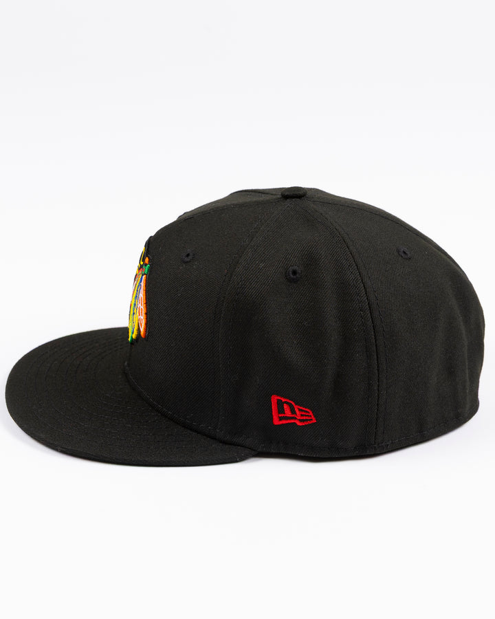black New Era fitted 59FIFTY hat with embroidered Chicago Blackhawks primary logo on front and secondary logo on back - left side lay flat