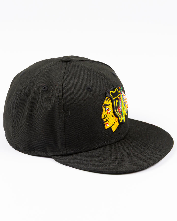 black New Era fitted 59FIFTY hat with embroidered Chicago Blackhawks primary logo on front and secondary logo on back - right angle lay flat