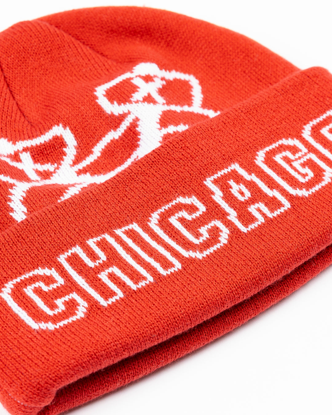 red Mitchell &amp; Ness knit beanie with Chicago Blackhawks secondary logo on front and Chicago wordmark - front angle lay flat