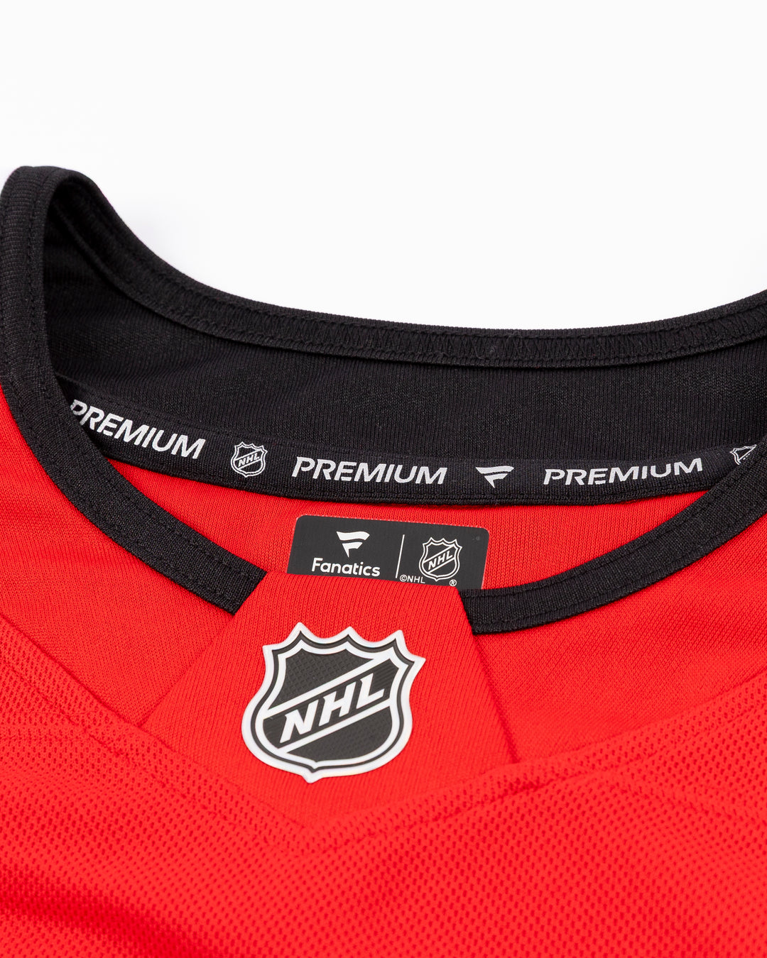 premium Fanatcs home Chicago Blackhawks jersey with Colton Dach name and number - neckline detail lay flat