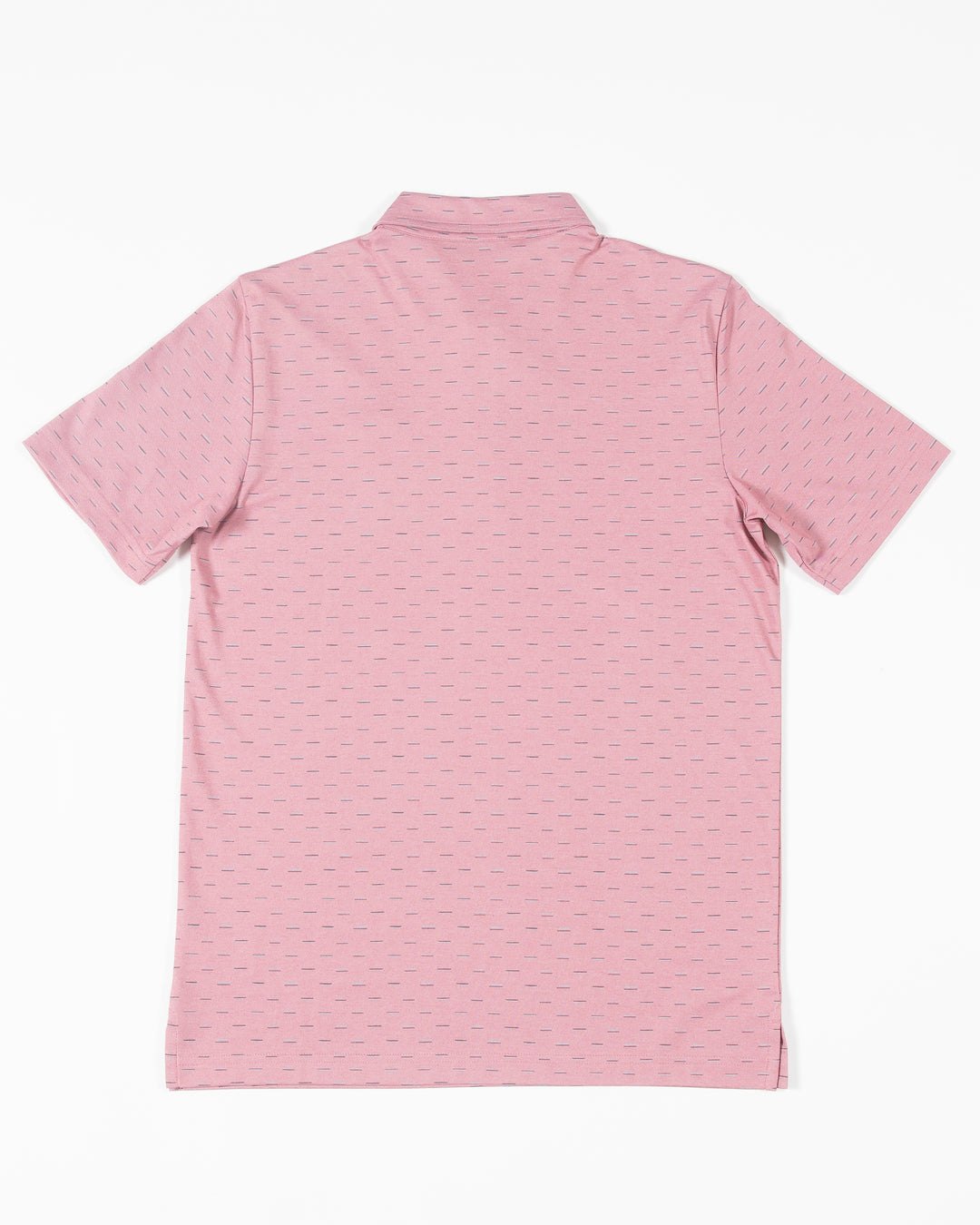 red geo print TravisMathew polo with embroidered tonal Chicago Blackhawks primary logo on left chest - back lay flat