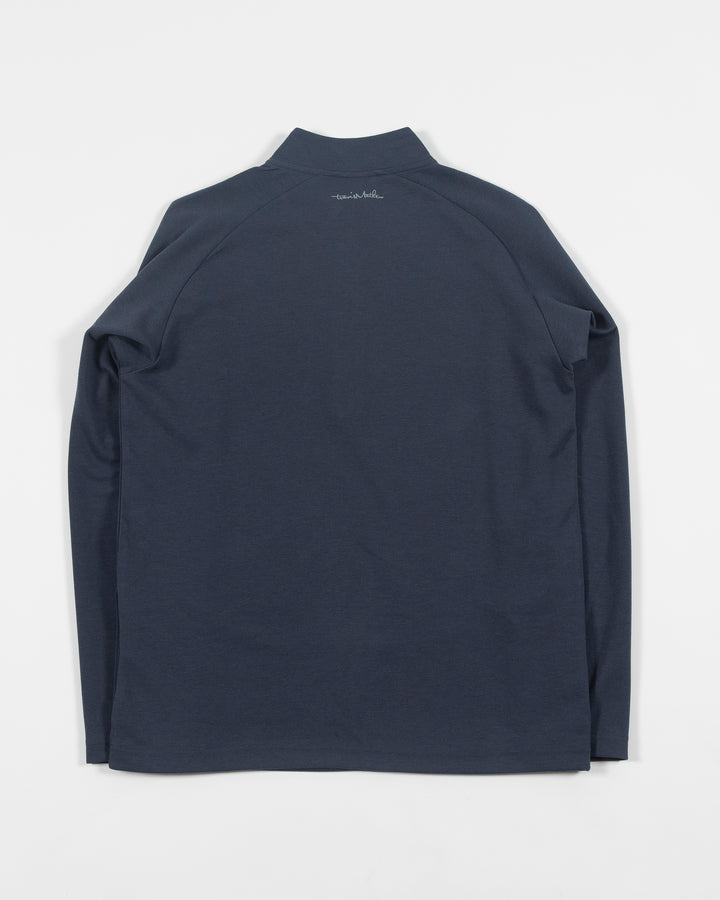 navy TravisMathew quarter zip with Chicago Blackhawks primary logo embroidered on left shoulder - back lay flat